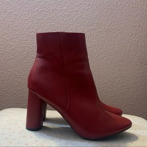 Fuchsia high heeled boots